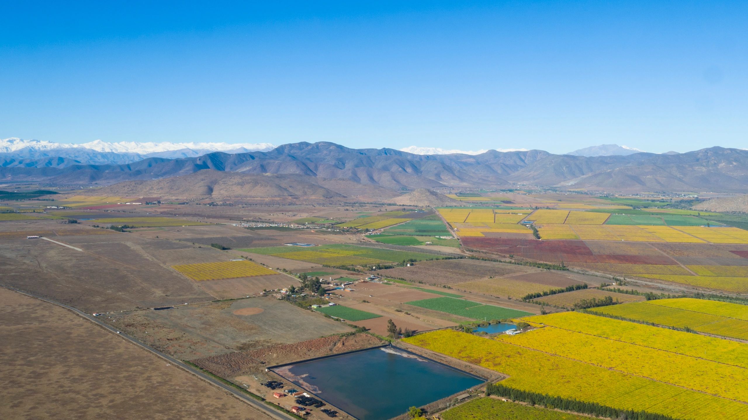 Scenic agricultural valley in central Chile with Andes backdrop